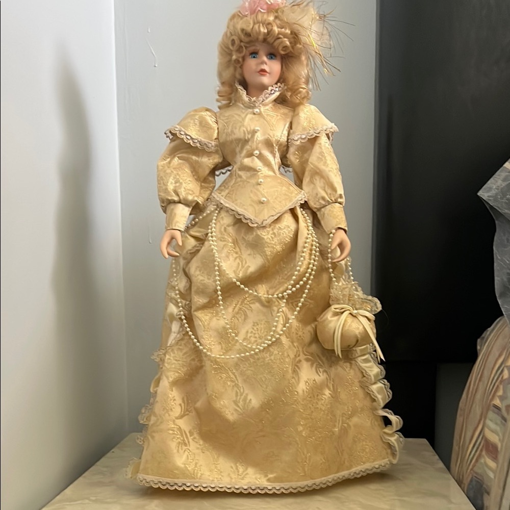 Elegant Victorian Porcelain Doll in Gold Dress
